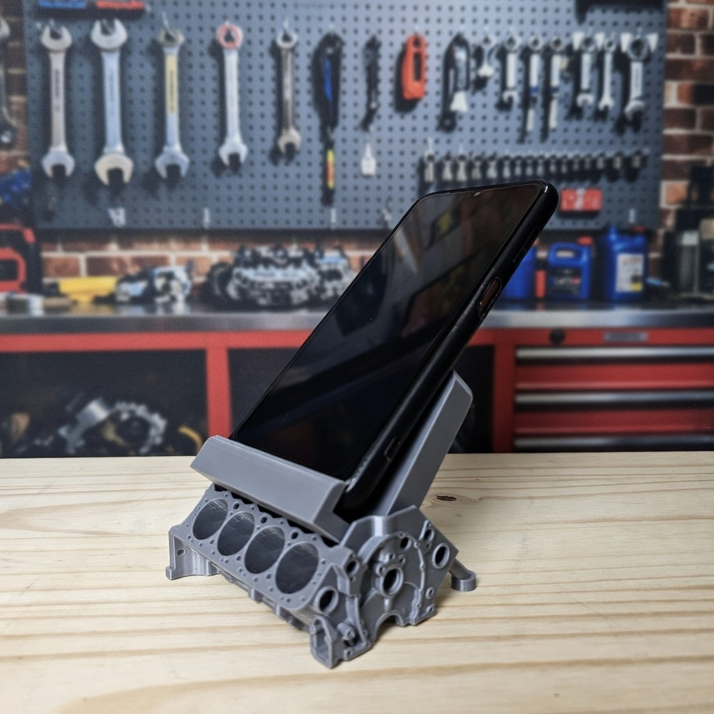 Suporte de Celular Criativo em Formato de Motor – Design Automotivo, Estável e Exclusivo